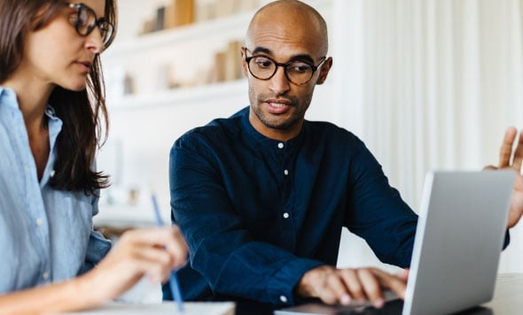 man-and-woman-at-laptop