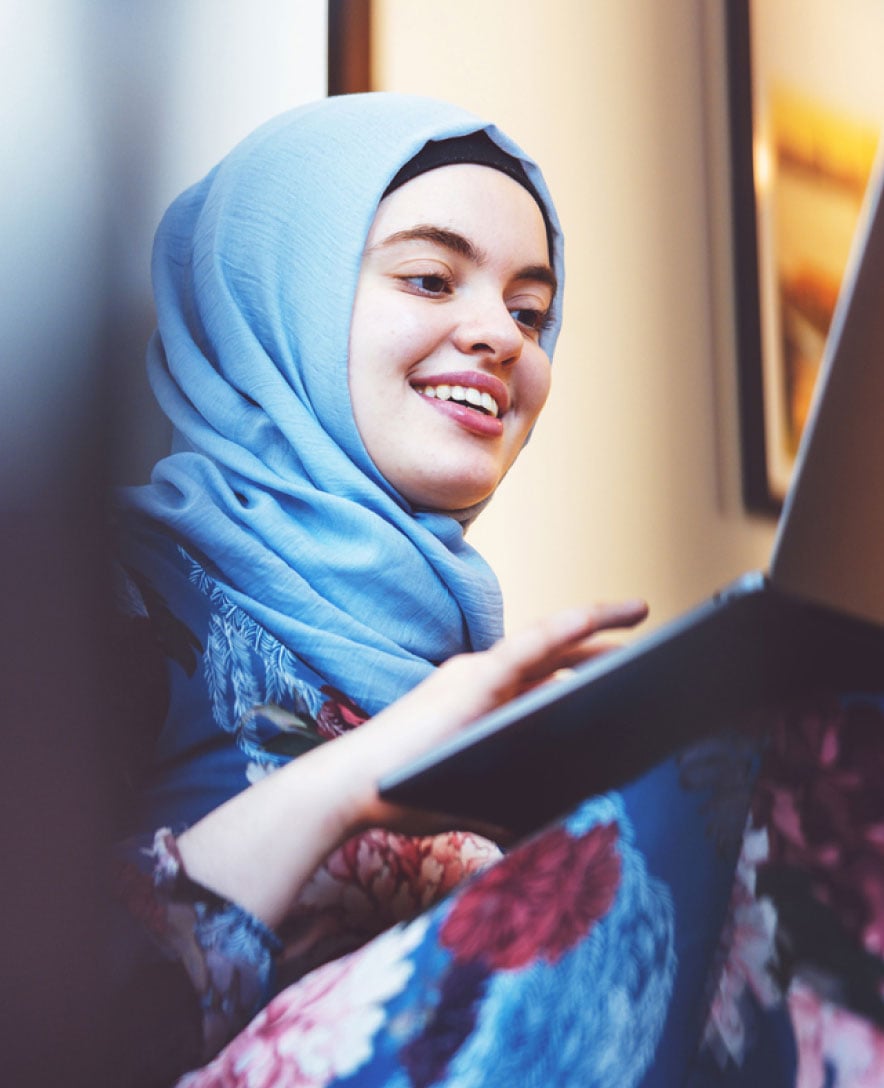 woman smiling laptop